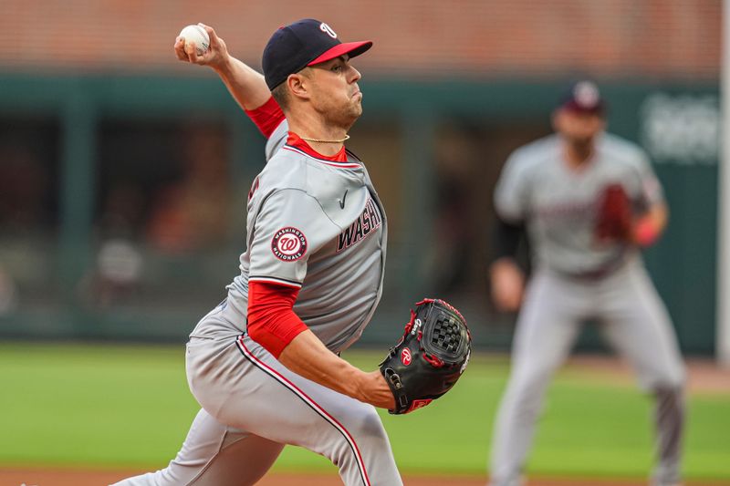 May 29, 2024; Cumberland, Georgia, USA; Washington Nationals starting pitcher MacKenzie Gore (1) pitches against the Atlanta Braves during the first inning at Truist Park. Mandatory Credit: Dale Zanine-USA TODAY Sports