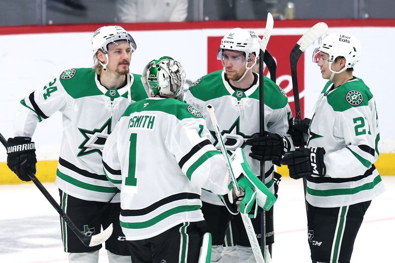 Dec 9, 2025; Winnipeg, Manitoba, CAN; Dallas Stars celebrate their victory over the Winnipeg Jets at Canada Life Centre. Mandatory Credit: James Carey Lauder-Imagn Images