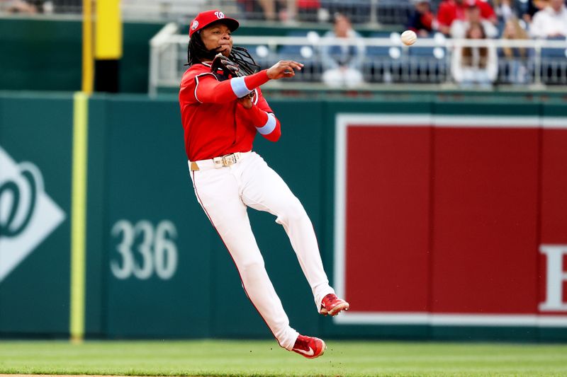 Apr 6, 2025; Washington, District of Columbia, USA; Washington Nationals shortstop CJ Abrams (5) throws to first base for an out during the seventh inning against the Arizona Diamondbacks at Nationals Park. Mandatory Credit: Daniel Kucin Jr.-Imagn Images