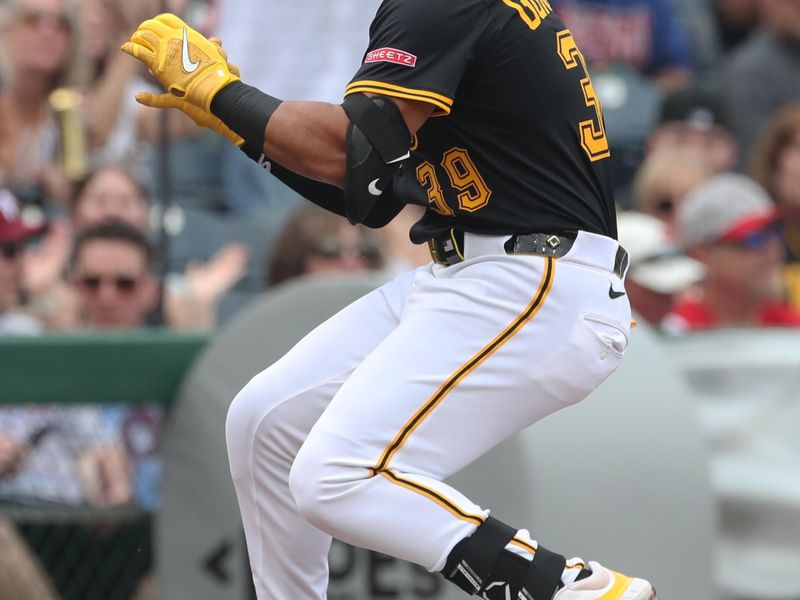 Jun 7, 2025; Pittsburgh, Pennsylvania, USA;  Pittsburgh Pirates second baseman Nick Gonzales (39) reacts at third base after hitting a triple the Philadelphia Phillies during the first inning against at PNC Park. Mandatory Credit: Charles LeClaire-Imagn Images