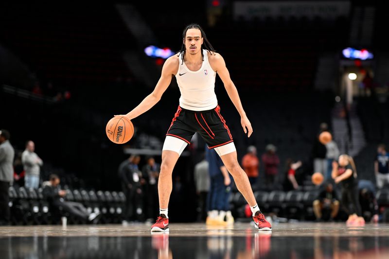 PORTLAND, OREGON - FEBRUARY 15: Dalano Banton #5 of the Portland Trail Blazers warms up before the game against the Minnesota Timberwolves at the Moda Center on February 15, 2024 in Portland, Oregon. NOTE TO USER: User expressly acknowledges and agrees that, by downloading and or using this photograph, User is consenting to the terms and conditions of the Getty Images License Agreement. (Photo by Alika Jenner/Getty Images)