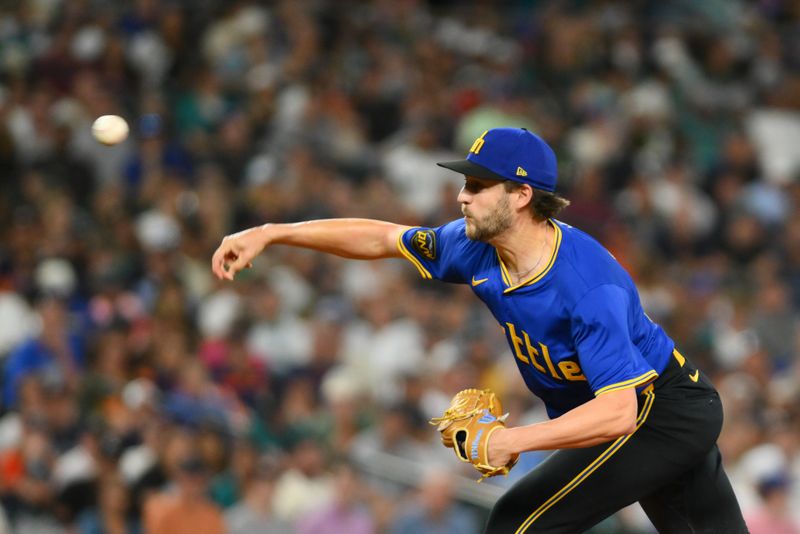 Jul 19, 2024; Seattle, Washington, USA; Seattle Mariners relief pitcher Collin Snider (52) pitches to the Houston Astros during the ninth inning at T-Mobile Park. Mandatory Credit: Steven Bisig-USA TODAY Sports