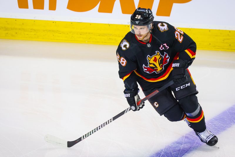 Jan 23, 2024; Calgary, Alberta, CAN; Calgary Flames center Elias Lindholm (28) skates during the warmup period against the St. Louis Blues at Scotiabank Saddledome. Mandatory Credit: Sergei Belski-USA TODAY Sports