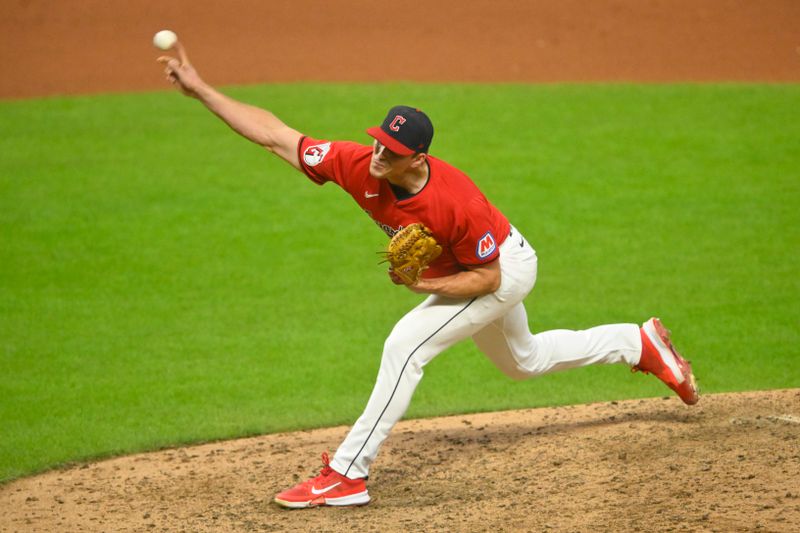 Aug 13, 2024; Cleveland, Ohio, USA; Cleveland Guardians relief pitcher Cade Smith (36) delivers a pitch in the seventh inning against the Chicago Cubs at Progressive Field. Mandatory Credit: David Richard-USA TODAY Sports