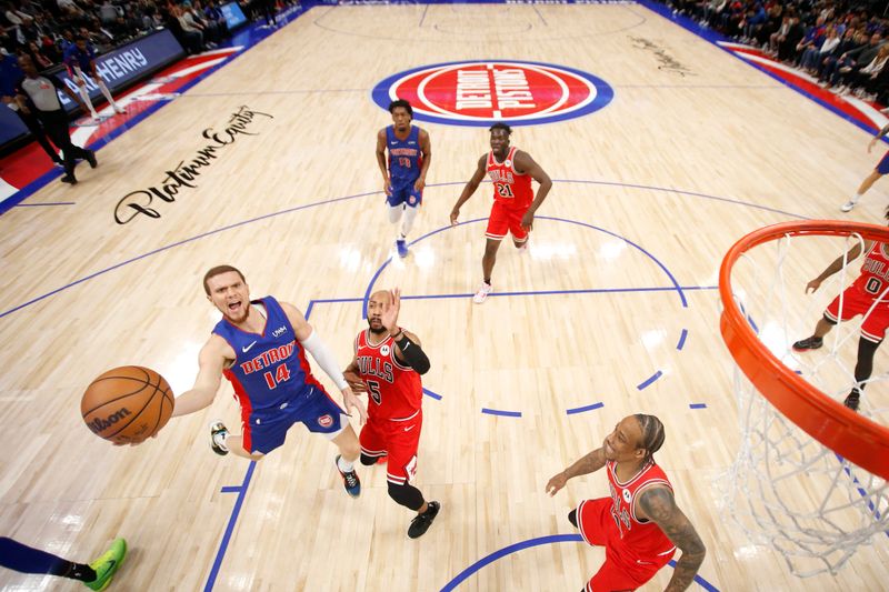 DETROIT, MI - APRIL 11: Malachi Flynn #14 of the Detroit Pistons shoots the ball during the game against the Chicago Bulls on April 11, 2024 at Little Caesars Arena in Detroit, Michigan. NOTE TO USER: User expressly acknowledges and agrees that, by downloading and/or using this photograph, User is consenting to the terms and conditions of the Getty Images License Agreement. Mandatory Copyright Notice: Copyright 2024 NBAE (Photo by Brian Sevald/NBAE via Getty Images)