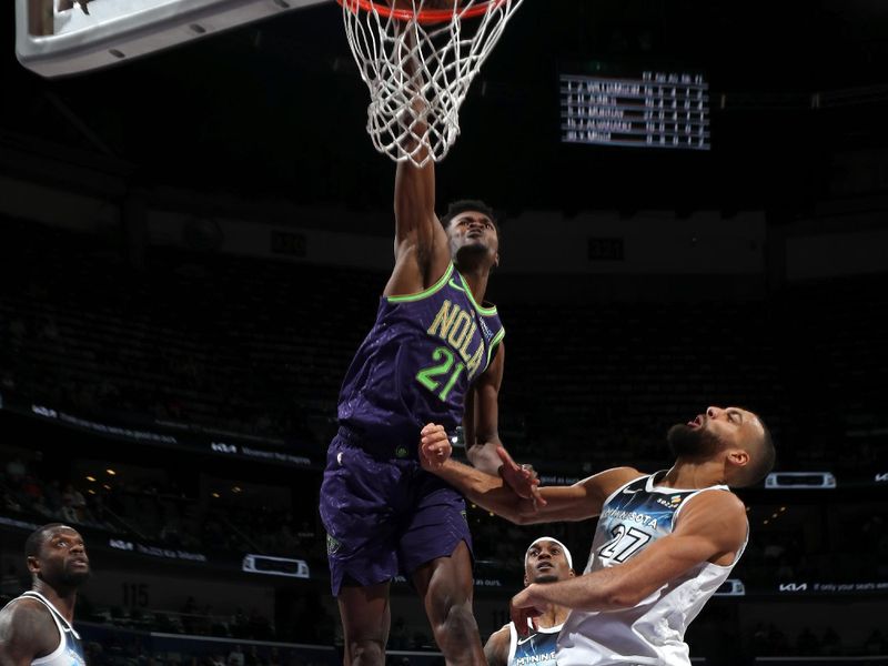 NEW ORLEANS, LA - JANUARY 7: Yves Missi #21 of the New Orleans Pelicans dunks the ball during the game against the Minnesota Timberwolves on January 7, 2025 at the Smoothie King Center in New Orleans, Louisiana. NOTE TO USER: User expressly acknowledges and agrees that, by downloading and or using this Photograph, user is consenting to the terms and conditions of the Getty Images License Agreement. Mandatory Copyright Notice: Copyright 2025 NBAE(Photo by Layne Murdoch Jr./NBAE via Getty Images)