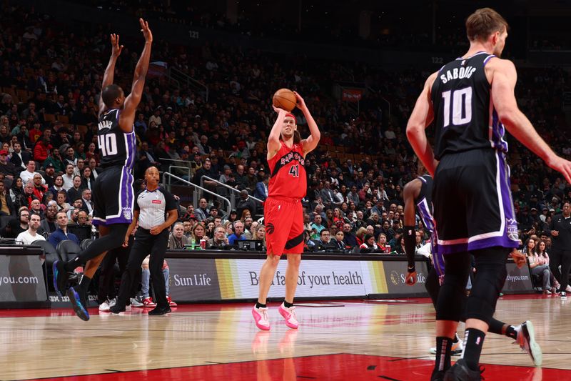 TORONTO, CANADA - MARCH 20: Kelly Olynyk #41 of the Toronto Raptor shoots the ball during the game against the Sacramento Kings on March 20, 2024 at the Scotiabank Arena in Toronto, Ontario, Canada.  NOTE TO USER: User expressly acknowledges and agrees that, by downloading and or using this Photograph, user is consenting to the terms and conditions of the Getty Images License Agreement.  Mandatory Copyright Notice: Copyright 2024 NBAE (Photo by Vaughn Ridley/NBAE via Getty Images)