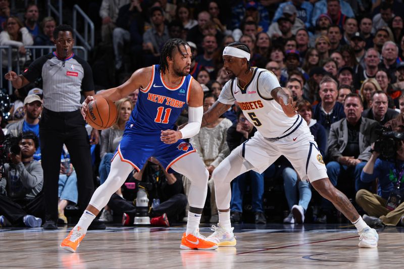 DENVER, CO - MARCH 21: Jalen Brunson #11 of the New York Knicks handles the ball during the game against the Denver Nuggets on March 21, 2024 at the Ball Arena in Denver, Colorado. NOTE TO USER: User expressly acknowledges and agrees that, by downloading and/or using this Photograph, user is consenting to the terms and conditions of the Getty Images License Agreement. Mandatory Copyright Notice: Copyright 2024 NBAE (Photo by Garrett Ellwood/NBAE via Getty Images)