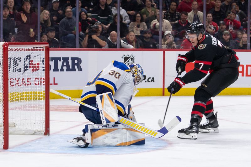 Oct 29, 2024; Ottawa, Ontario, CAN; St. Louis Blues goalie Jordan Binnington (30) makes a save on a shot from  Ottawa Senators left wing Brady Tkachuk (7) in the first period at the Canadian Tire Centre. Mandatory Credit: Marc DesRosiers-Imagn Images