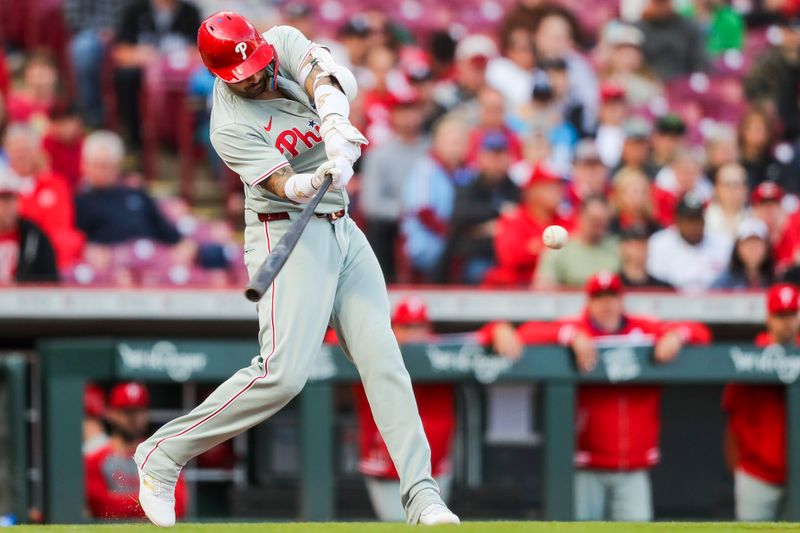 Apr 22, 2024; Cincinnati, Ohio, USA; Philadelphia Phillies outfielder Nick Castellanos (8) hits a single against the Cincinnati Reds in the second inning at Great American Ball Park. Mandatory Credit: Katie Stratman-USA TODAY Sports