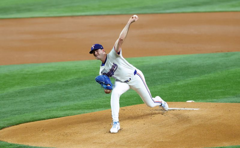 Sep 18, 2024; Arlington, Texas, USA;  Texas Rangers starting pitcher Cody Bradford (61) throws during the first inning against the Toronto Blue Jays at Globe Life Field. Mandatory Credit: Kevin Jairaj-Imagn Images