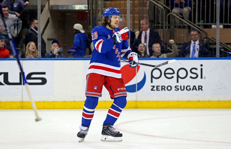 Apr 5, 2023; New York, New York, USA; New York Rangers left wing Artemi Panarin (10) celebrates his goal against the Tampa Bay Lightning during the third period at Madison Square Garden. Mandatory Credit: Danny Wild-USA TODAY Sports