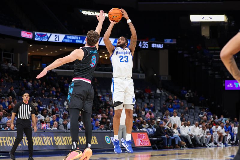Jan 29, 2026; Memphis, Tennessee, USA; Memphis Tigers guard Sincere Parker (23) shoots the ball against Florida Atlantic Owls guard Max Langenfeld (9) during the first half at FedExForum. Mandatory Credit: Wesley Hale-Imagn Images