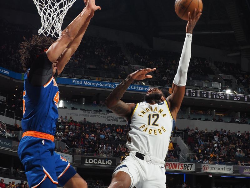 INDIANAPOLIS, IN - APRIL 5: Oshae Brissett #12 of the Indiana Pacers drives to the basket during the game against the New York Knicks on April 5, 2023 at Gainbridge Fieldhouse in Indianapolis, Indiana. NOTE TO USER: User expressly acknowledges and agrees that, by downloading and or using this Photograph, user is consenting to the terms and conditions of the Getty Images License Agreement. Mandatory Copyright Notice: Copyright 2023 NBAE (Photo by Ron Hoskins/NBAE via Getty Images)