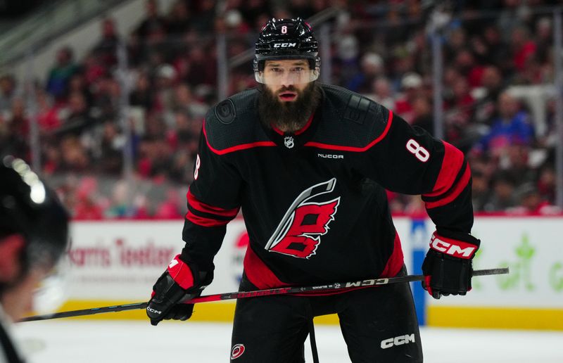 Apr 22, 2024; Raleigh, North Carolina, USA; Carolina Hurricanes defenseman Brent Burns (8) looks on against the New York Islanders during the first period in game two of the first round of the 2024 Stanley Cup Playoffs at PNC Arena. Mandatory Credit: James Guillory-USA TODAY Sports