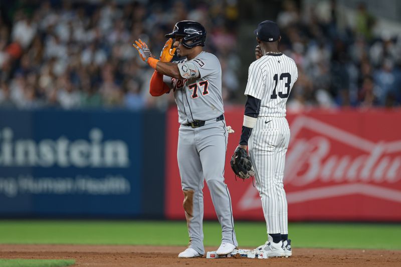 Sep 10, 2025; Bronx, New York, USA; Detroit Tigers third baseman Andy Ibanez (77) double during the second inning against the New York Yankees at Yankee Stadium. Mandatory Credit: Vincent Carchietta-Imagn Images