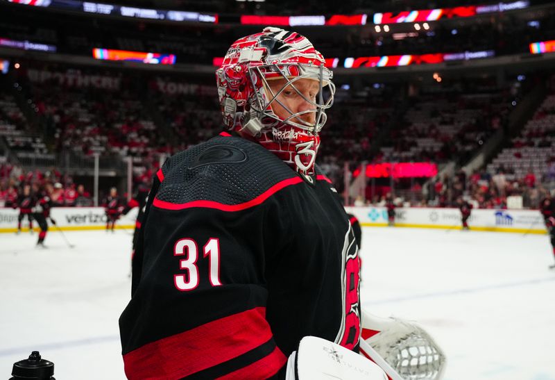 Apr 22, 2024; Raleigh, North Carolina, USA; Carolina Hurricanes goaltender Frederik Andersen (31) looks on during the warmups against the New York Islanders in game two of the first round of the 2024 Stanley Cup Playoffs at PNC Arena. Mandatory Credit: James Guillory-USA TODAY Sports