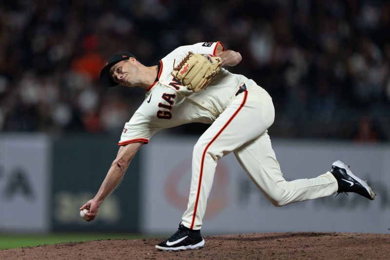 Apr 18, 2024; San Francisco, California, USA;  San Francisco Giants pitcher Tyler Rogers (71) pitches during the seventh inning against the Arizona Diamondbacks at Oracle Park. Mandatory Credit: Stan Szeto-USA TODAY Sports