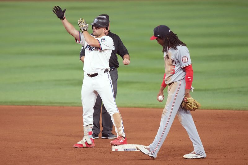 Sep 11, 2025; Miami, Florida, USA;  Miami Marlins center fielder Jakob Marsee (87) celebrates a double in the eighth inning against the Washington Nationals at loanDepot Park. Mandatory Credit: Jim Rassol-Imagn Images