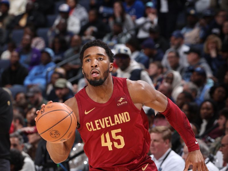 MEMPHIS, TN - FEBRUARY 1:  Donovan Mitchell #45 of the Cleveland Cavaliers handles the ball during the game  against the Memphis Grizzlies on February 1, 2024 at FedExForum in Memphis, Tennessee. NOTE TO USER: User expressly acknowledges and agrees that, by downloading and or using this photograph, User is consenting to the terms and conditions of the Getty Images License Agreement. Mandatory Copyright Notice: Copyright 2024 NBAE (Photo by Joe Murphy/NBAE via Getty Images)