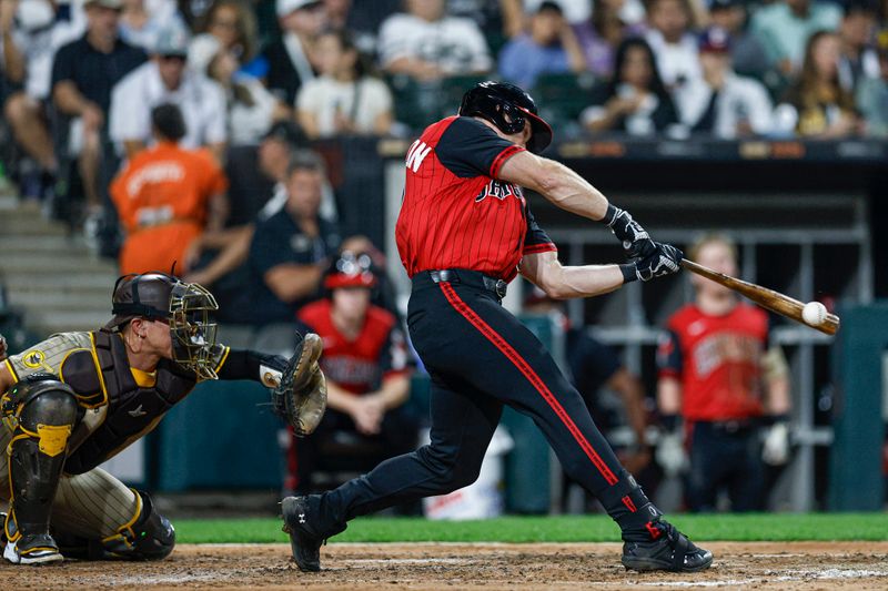 Sep 19, 2025; Chicago, Illinois, USA; Chicago White Sox left fielder Will Robertson (37) hits an RBI-single against the San Diego Padres during the fourth inning at Rate Field. Mandatory Credit: Kamil Krzaczynski-Imagn Images