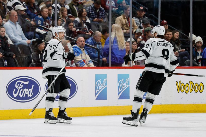 Jan 26, 2024; Denver, Colorado, USA; Los Angeles Kings left wing Kevin Fiala (22) celebrates his goal with defenseman Drew Doughty (8) in the second period against the Colorado Avalanche at Ball Arena. Mandatory Credit: Isaiah J. Downing-USA TODAY Sports