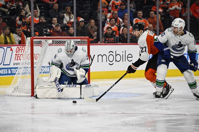 Oct 17, 2023; Philadelphia, Pennsylvania, USA; Vancouver Canucks goaltender Thatcher Demko (35) makes a save in the third period against the Philadelphia Flyers at the Wells Fargo Center. The Flyers won 2-0. Mandatory Credit: John Geliebter-USA TODAY Sports