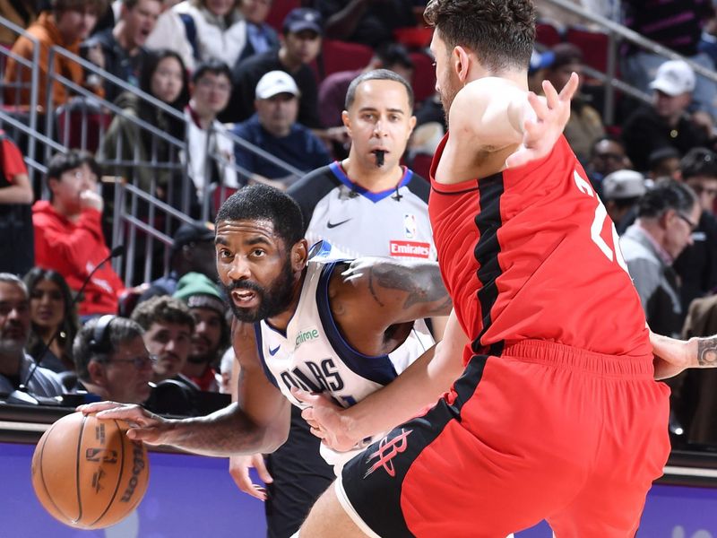 HOUSTON, TX - JANUARY 01   Kyrie Irving #11 of the Dallas Mavericks drives to the basket during the game against the Houston Rockets on January 01, 2025 at the Toyota Center in Houston, Texas. NOTE TO USER: User expressly acknowledges and agrees that, by downloading and or using this photograph, User is consenting to the terms and conditions of the Getty Images License Agreement. Mandatory Copyright Notice: Copyright 2025 NBAE (Photo by Logan Riely/NBAE via Getty Images)