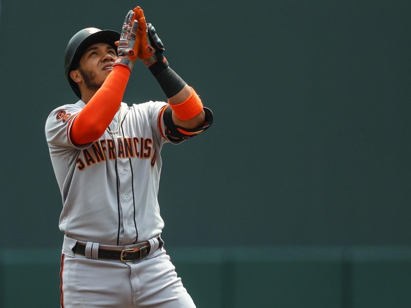 May 24, 2023; Minneapolis, Minnesota, USA; San Francisco Giants designated hitter Thairo Estrada (39) celebrates a double in the first inning against the Minnesota Twins at Target Field. Mandatory Credit: Matt Krohn-USA TODAY Sports