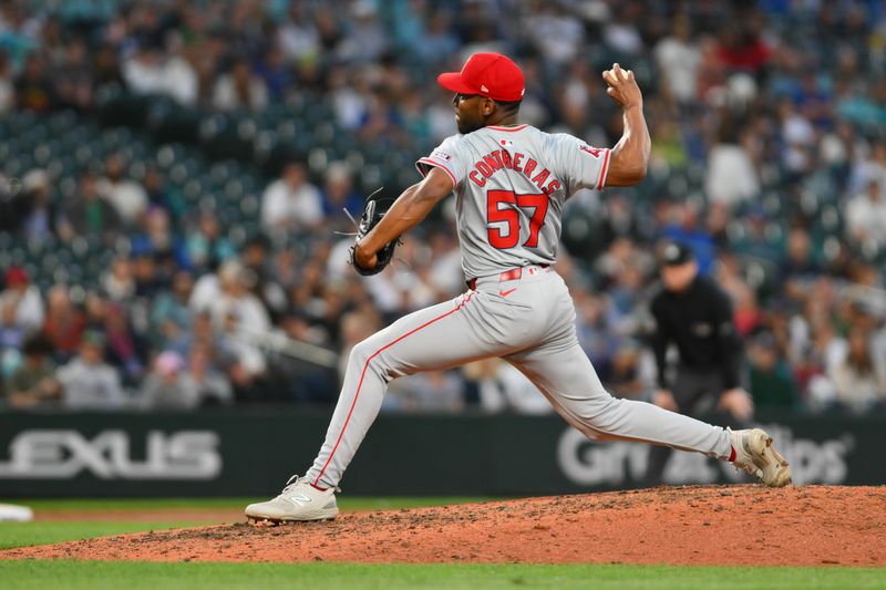 Jul 23, 2024; Seattle, Washington, USA; Los Angeles Angels relief pitcher Roansy Contreras (57) pitches to the Seattle Mariners during the ninth inning at T-Mobile Park. Mandatory Credit: Steven Bisig-USA TODAY Sports