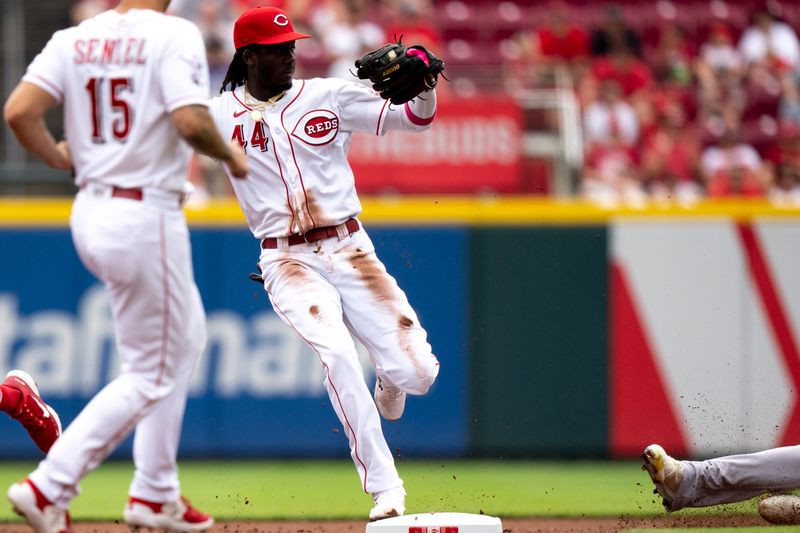 Aug 9, 2023; Cincinnati, OH, USA; Cincinnati Reds shortstop Elly De La Cruz (44) tags second to get Miami Marlins designated hitter Jorge Soler (12) out at second base off of a hit from Miami Marlins second baseman Luis Arraez (3) in the first inning of the MLB baseball game between Cincinnati Reds and Miami Marlins at Great American Ball Park in Cincinnati on Wednesday, Aug. 9, 2023.  Mandatory Credit: Albert Cesare-USA TODAY Sports