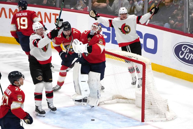 Feb 20, 2024; Sunrise, Florida, USA; Ottawa Senators center Tim Stutzle (18) celebrates a goal against the Florida Panthers during the third period at Amerant Bank Arena. Mandatory Credit: Jim Rassol-USA TODAY Sports