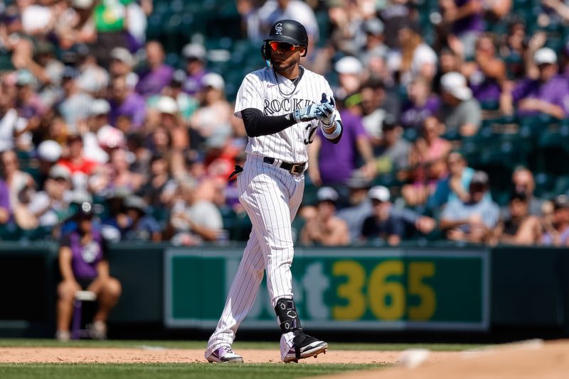 Aug 20, 2023; Denver, Colorado, USA; Colorado Rockies second baseman Harold Castro (30) react after hitting a two RBI single in the fifth inning against the Chicago White Sox at Coors Field. Mandatory Credit: Isaiah J. Downing-USA TODAY Sports