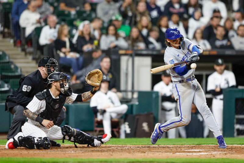 Sep 13, 2023; Chicago, Illinois, USA; Kansas City Royals shortstop Bobby Witt Jr. (7) hits an RBI-sacrifice fly against the Chicago White Sox during the seventh inning at Guaranteed Rate Field. Mandatory Credit: Kamil Krzaczynski-USA TODAY Sports