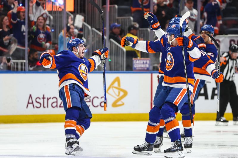 Apr 27, 2024; Elmont, New York, USA; New York Islanders center Jean-Gabriel Pageau (44) celebrates after scoring a goal in the third period against the Carolina Hurricanes in game four of the first round of the 2024 Stanley Cup Playoffs at UBS Arena. Mandatory Credit: Wendell Cruz-USA TODAY Sports