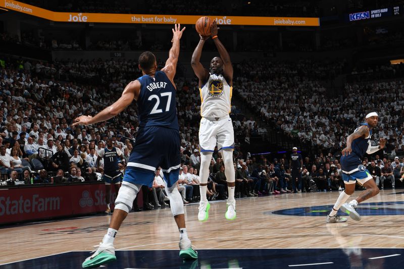 MINNEAPOLIS, MN -  MAY 14: Draymond Green #23 of the Golden State Warriors shoots the ball during the game against the Minnesota Timberwolves during Round 2 Game 5 of the 2025 NBA Playoffs on May 14, 2025 at Target Center in Minneapolis, Minnesota. NOTE TO USER: User expressly acknowledges and agrees that, by downloading and or using this Photograph, user is consenting to the terms and conditions of the Getty Images License Agreement. Mandatory Copyright Notice: Copyright 2025 NBAE (Photo by Noah Graham/NBAE via Getty Images)