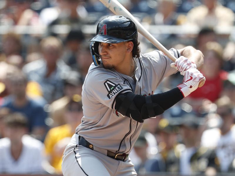 Aug 4, 2024; Pittsburgh, Pennsylvania, USA;  Arizona Diamondbacks center ielder Alek Thomas (5) at bat against the Pittsburgh Pirates during the fifth inning at PNC Park. Mandatory Credit: Charles LeClaire-USA TODAY Sports