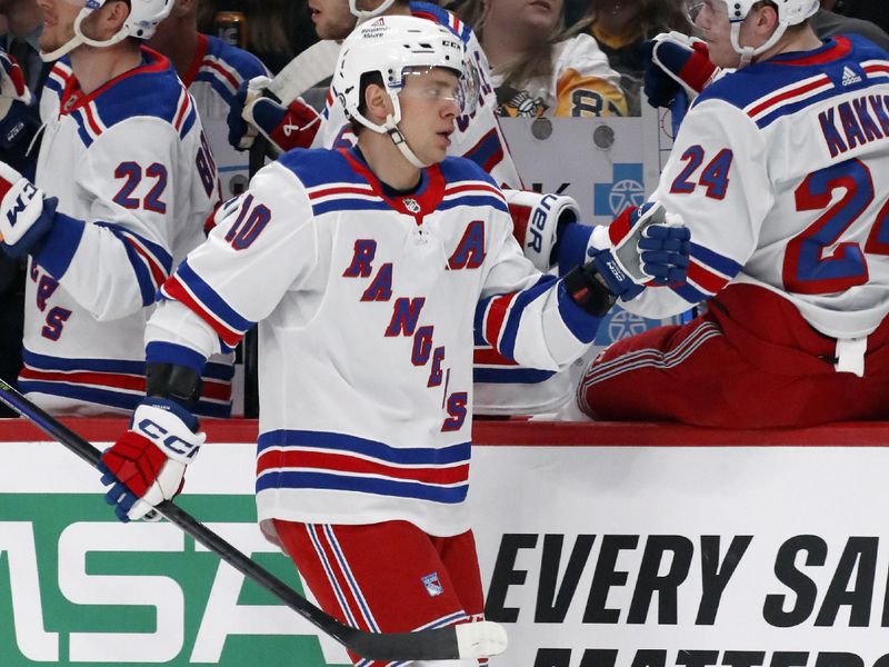 Mar 16, 2024; Pittsburgh, Pennsylvania, USA;  New York Rangers left wing Artemi Panarin (10) celebrates with the Rangers bench after scoring a goal against the Pittsburgh Penguins during the first period at PPG Paints Arena. New York won 7-4. Mandatory Credit: Charles LeClaire-USA TODAY Sports