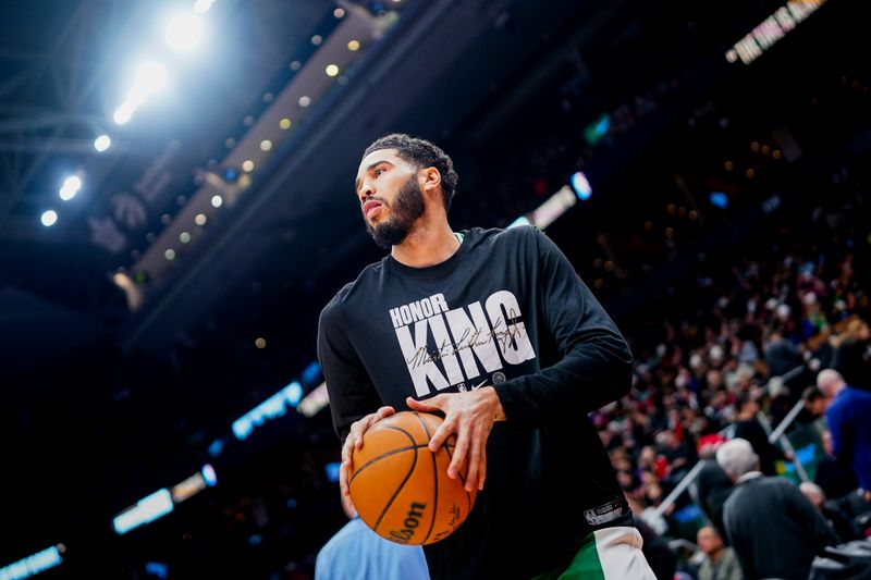 TORONTO, CANADA - JANUARY 15:  Jayson Tatum #0 of the Boston Celtics warms up before the game against the Toronto Raptors on January 15, 2024 at the Scotiabank Arena in Toronto, Ontario, Canada.  NOTE TO USER: User expressly acknowledges and agrees that, by downloading and or using this Photograph, user is consenting to the terms and conditions of the Getty Images License Agreement.  Mandatory Copyright Notice: Copyright 2024 NBAE (Photo by Mark Blinch/NBAE via Getty Images)