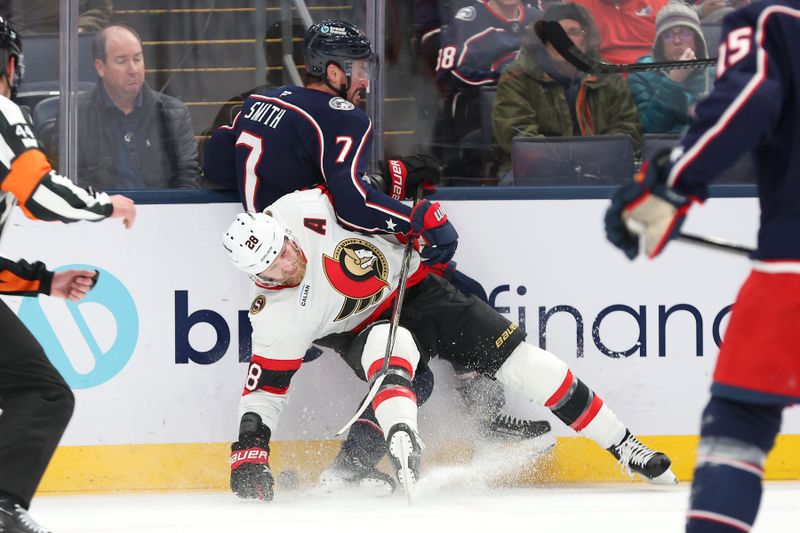 Dec 11, 2025; Columbus, Ohio, USA; Columbus Blue Jackets defenseman Brendan Smith (7) checks Ottawa Senators right wing Claude Giroux (28) during the first period at Nationwide Arena. Mandatory Credit: Joseph Maiorana-Imagn Images