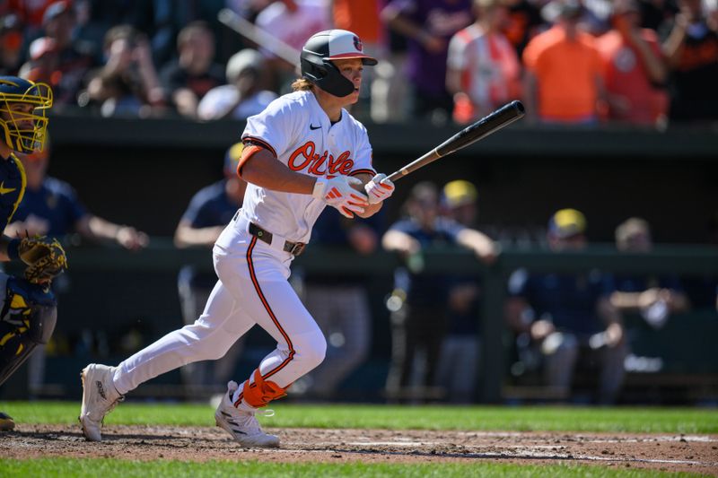 Apr 14, 2024; Baltimore, Maryland, USA; Baltimore Orioles second base Jackson Holliday (7) hits a single during the seventh inning against the Milwaukee Brewers at Oriole Park at Camden Yards. Mandatory Credit: Reggie Hildred-USA TODAY Sports