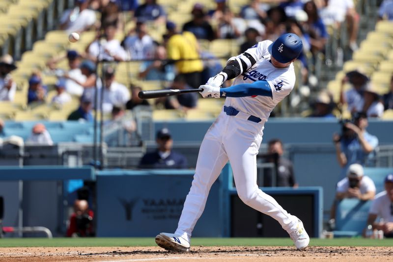 Sep 8, 2024; Los Angeles, California, USA;  Los Angeles Dodgers designated hitter Shohei Ohtani (17) hits a home run during the fifth inning against the Cleveland Guardians at Dodger Stadium. Mandatory Credit: Kiyoshi Mio-Imagn Images