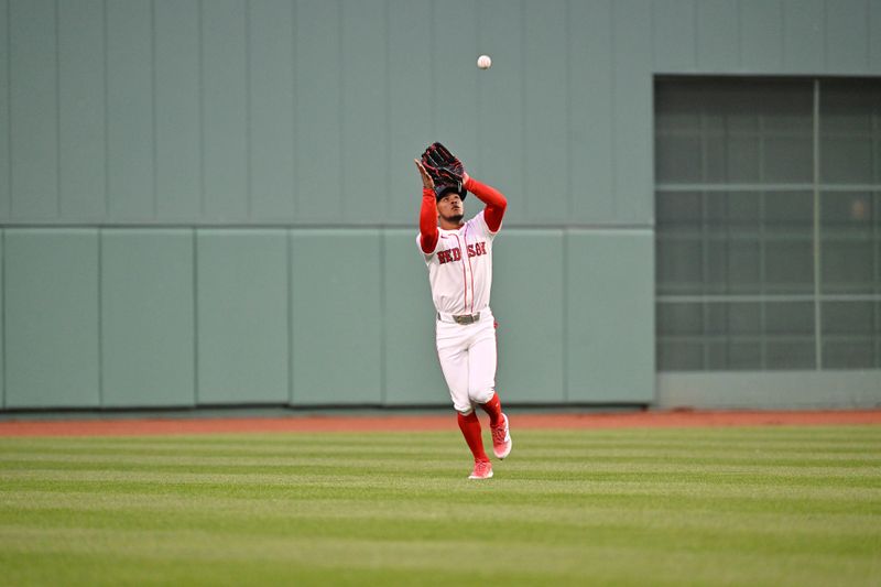 Apr 10, 2025; Boston, Massachusetts, USA; Boston Red Sox center fielder Ceddanne Rafaela (3) makes a catch for an out against the Toronto Blue Jays during the tenth inning at Fenway Park. Mandatory Credit: Eric Canha-Imagn Images