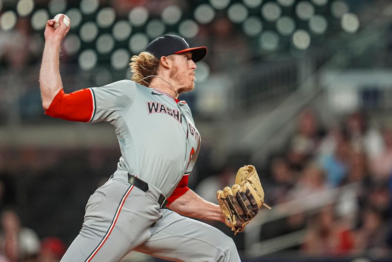 May 29, 2024; Cumberland, Georgia, USA; Washington Nationals relief pitcher Jordan Weems (51) pitches against the Atlanta Braves during the ninth inning at Truist Park. Mandatory Credit: Dale Zanine-USA TODAY Sports