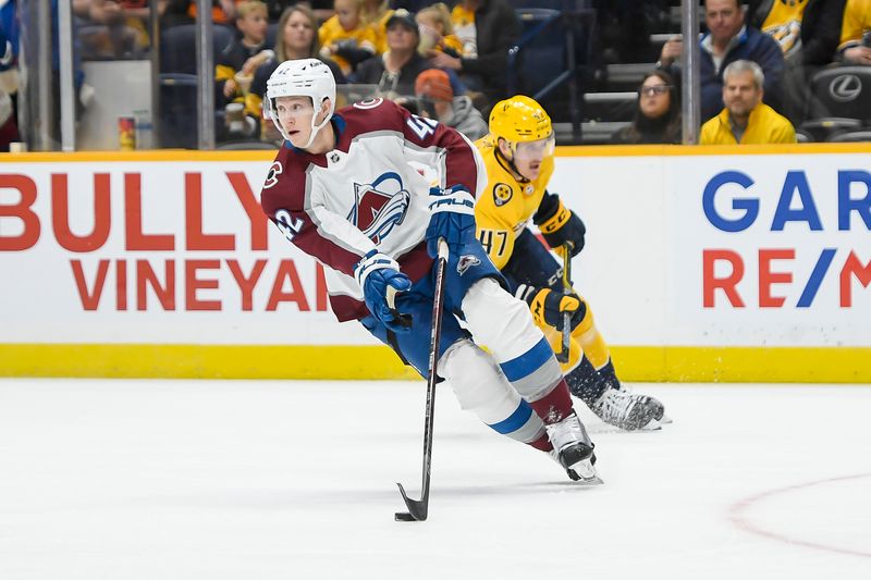 Nov 20, 2023; Nashville, Tennessee, USA; Colorado Avalanche defenseman Josh Manson (42) skates against the Nashville Predators during the first period at Bridgestone Arena. Mandatory Credit: Steve Roberts-USA TODAY Sports