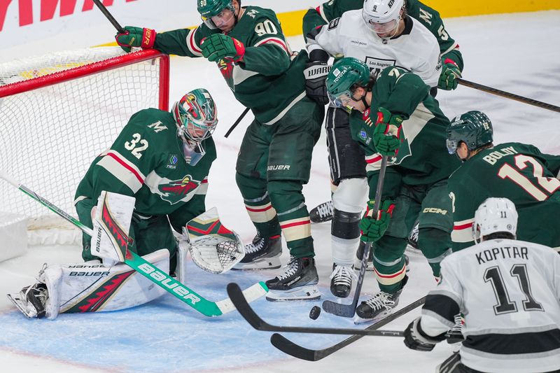 Nov 5, 2024; Saint Paul, Minnesota, USA; Minnesota Wild goaltender Filip Gustavsson (32) makes a save against the Los Angeles Kings in the third period at Xcel Energy Center. Mandatory Credit: Brad Rempel-Imagn Images