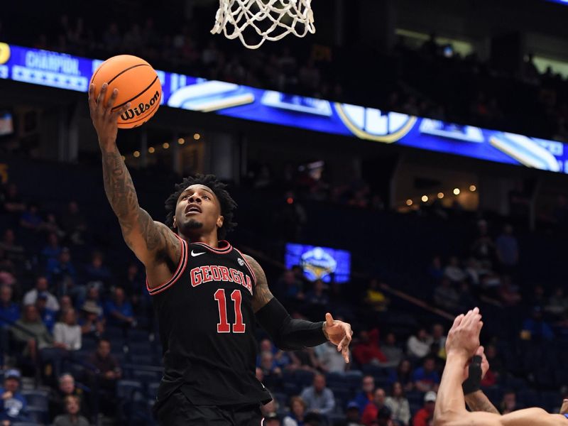 Mar 14, 2024; Nashville, TN, USA; Georgia Bulldogs guard Justin Hill (11) scores during the second half against the Florida Gators at Bridgestone Arena. Mandatory Credit: Christopher Hanewinckel-USA TODAY Sports