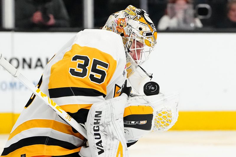 Jan 20, 2024; Las Vegas, Nevada, USA; Pittsburgh Penguins goaltender Tristan Jarry (35) makes a save against the Vegas Golden Knights during the third period at T-Mobile Arena. Mandatory Credit: Stephen R. Sylvanie-USA TODAY Sports