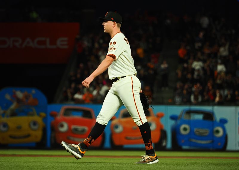 Aug 28, 2023; San Francisco, California, USA; San Francisco Giants starting pitcher Kyle Harrison (45) walks off the field after the top of the fifth inning against the Cincinnati Reds at Oracle Park. Mandatory Credit: Kelley L Cox-USA TODAY Sports