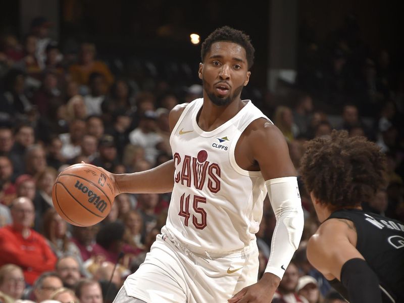 CLEVELAND, OH - NOVEMBER 9: Donovan Mitchell #45 of the Cleveland Cavaliers looks on during the game against the Brooklyn Nets on November 9, 2024 at Rocket Mortgage FieldHouse in Cleveland, Ohio. NOTE TO USER: User expressly acknowledges and agrees that, by downloading and/or using this Photograph, user is consenting to the terms and conditions of the Getty Images License Agreement. Mandatory Copyright Notice: Copyright 2024 NBAE (Photo by David Liam Kyle/NBAE via Getty Images)